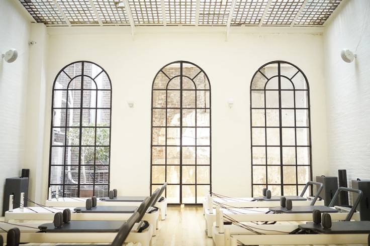 Beautiful pilates studio with big windows and great natural light